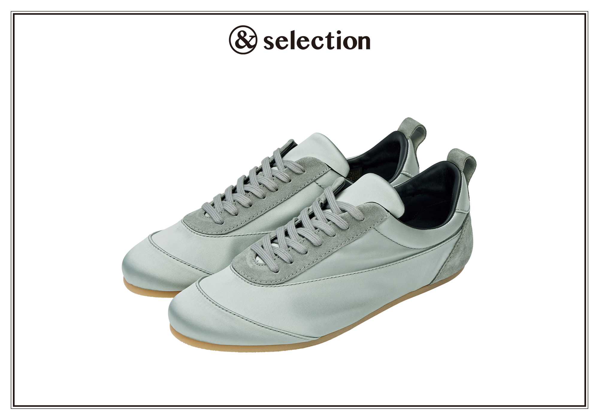 バレリーナシューズから着想を得た、〈ジル サンダー〉のサテンスニーカー。