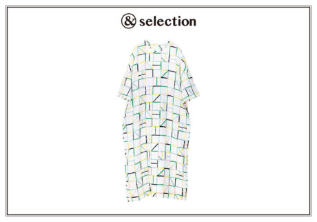 揺らぐ光の様子を色紙の切り絵で表現した、〈ミナ ペルホネン〉のドレス。