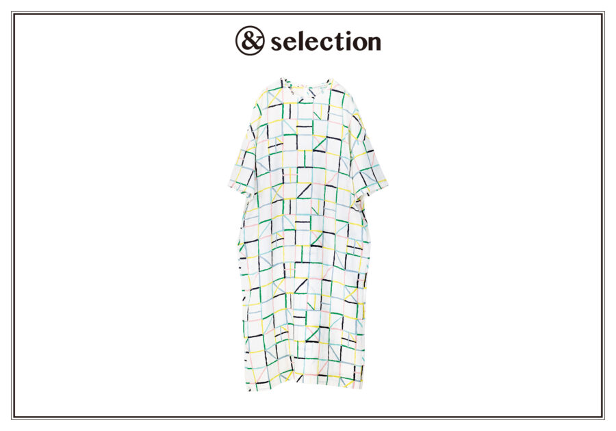 揺らぐ光の様子を色紙の切り絵で表現した、〈ミナ ペルホネン〉のドレス。