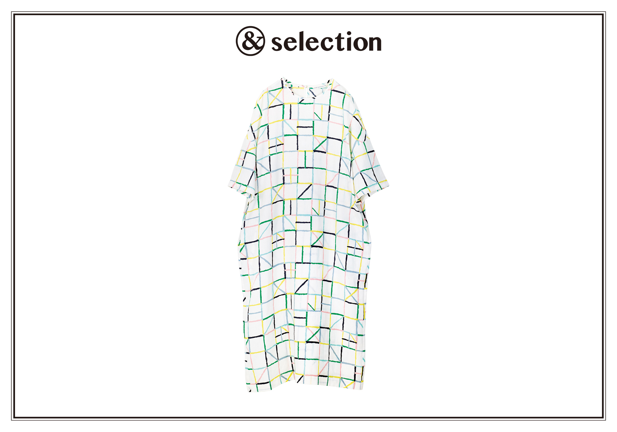 揺らぐ光の様子を色紙の切り絵で表現した、〈ミナ ペルホネン〉のドレス。